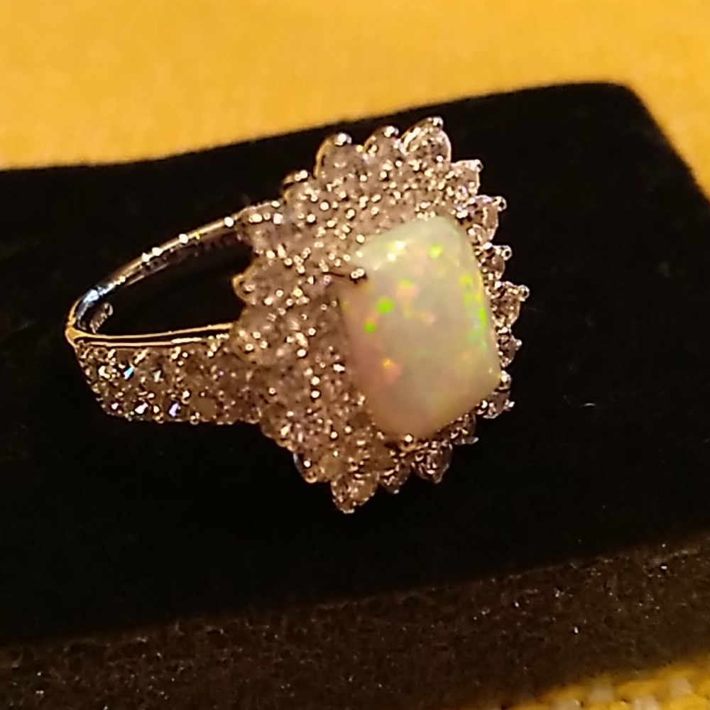 Never worn opal silver ring